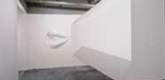 Ricci Albenda. <i>Tesseract</i>. 2001. Installation view. Wallboard, gatorboard, fiberglass, aluminum, paint, and light, 25 x 30 x 10' (762 x 914.4 x 304.8 cm) (approx.). Courtesy Andrew Kreps Gallery, New York