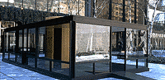 Rirkrit Tiravanija. <i>Untitled: 1997 (Playtime)</i>. 1997. Wood and glass. 16' x 28' x 6'2". Designed in collaboration with Richard Jansen, architect. Photo: Ken Collins.