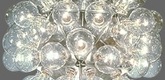 Achille Castiglioni. <i>Taraxacum 88</i>. 1988. Aluminum, light bulbs, 23 5/8 x 23 5/8 x 23 5/8" Manufactured and lent by Flos. This image may not be reproduced in any form without the permission of The Museum of Modern Art.