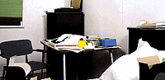 Thomas Demand. <i>Zimmer (Room)</i>. 1996. Chromogenic color print. 67 3/4 x 91 3/8". Lent by the artist.