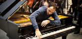 Jennifer Allora and Guillermo Calzadilla. <i>Stop, Repair, Prepare: Variations on “Ode to Joy” for a Prepared Piano</i>. 2008. Prepared Bechstein piano, pianist (Amir Khosrowpour shown). Piano: 40 x 67 x 84" (101.6 x 170.2 x 213.4 cm). The Museum of Modern Art. Gift of the Julia Stoschek Foundation, D&uuml;sseldorf. &copy; 2011 Yi-Chun Wu/The Museum of Modern Art 