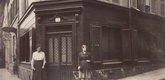 Eug&egrave;ne Atget. <i>Coin, Boulevard de la Chapelle et Rue Fleury 76, 18E.</i> June 1921. Matte albumen silver print, 6 13/16 x 9" (17.3 x 22.9 cm). The Museum of Modern Art, New York. Abbott-Levy Collection. Partial gift of Shirley C. Burden
