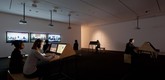 Andrea Geyer, Sharon Hayes, Ashley Hunt, Katya Sander, David Thorne. <i>9 Scripts from a Nation at War.</i>  2007. Ten-channel video installation (color, sound). The Museum of Modern Art, New York. Committee on Media and Performance Art Funds. &copy; 2012 the artists. Photograph by Jonathan Muzikar