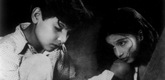 <i>Boot Polish</i>. 1953. India. Directed by Prakash Arora. Pictured: Rattan Kumar (left) and Kumari Naaz (right).  Image courtesy of University of California, Berkeley Art Museum & Pacific Film Archive