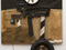 Robert Rauschenberg. <i>First Landing Jump</i>. 1961. Cloth, metal, leather, electric fixture, cable, and oil paint on composition board, with automobile tire and wood plank, 7' 5 1/8" x 6' x 8 7/8" (226.3 x 182.8 x 22.5 cm). Gift of Philip Johnson