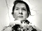 Marina Abramović. <i>Portrait with Flowers.</i> 2009. Black-and-white gelatin silver print; photo: Marco Anelli. &copy; 2010 Marina Abramović. Courtesy the artist and Sean Kelly Gallery/Artists Rights Society (ARS), New York