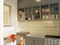 Margarete Sch&uuml;tte-Lihotzky. Frankfurt Kitchen from the H&ouml;henblick Housing Estate, Frankfurt, Germany (reconstruction). 1926&ndash;27. Various materials, 8’9” x 12’10” x 6’10” (266.7 x 391.2 x 208.3 cm). The Museum of Modern Art, New York. Gift of Joan R. Brewster in memory of her Husband George W.W. Brewster, by exchange and the Architecture & Design Purchase Fund