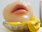 Alina Szapocznikow. <i>Petit Dessert I (Small Dessert I).</i> 1970&ndash;71. Colored polyester resin and glass, 3 3/16 x 4 5/16 x 5 1/8″ (8 x 11 x 13 cm). Kravis Collection. &copy; The Estate of Alina Szapocznikow/Piotr Stanisławski/ADAGP, Paris. Photo by Thomas Mueller, courtesy Broadway 1602, New York; and Galerie Gisela Capitain GmbH, Cologne