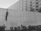 Jens S. Jensen (Swedish, born 1946). <i>Boy on the Wall, Hammarkullen</i>, Gothenburg. 1973. Photograph of Michael (age 9). Gelatin silver print, 9 7/16 x 11 3/4″ (24 x 29.8 cm). The Museum of Modern Art, New York. Gift of Jens S. Jensen, 2012