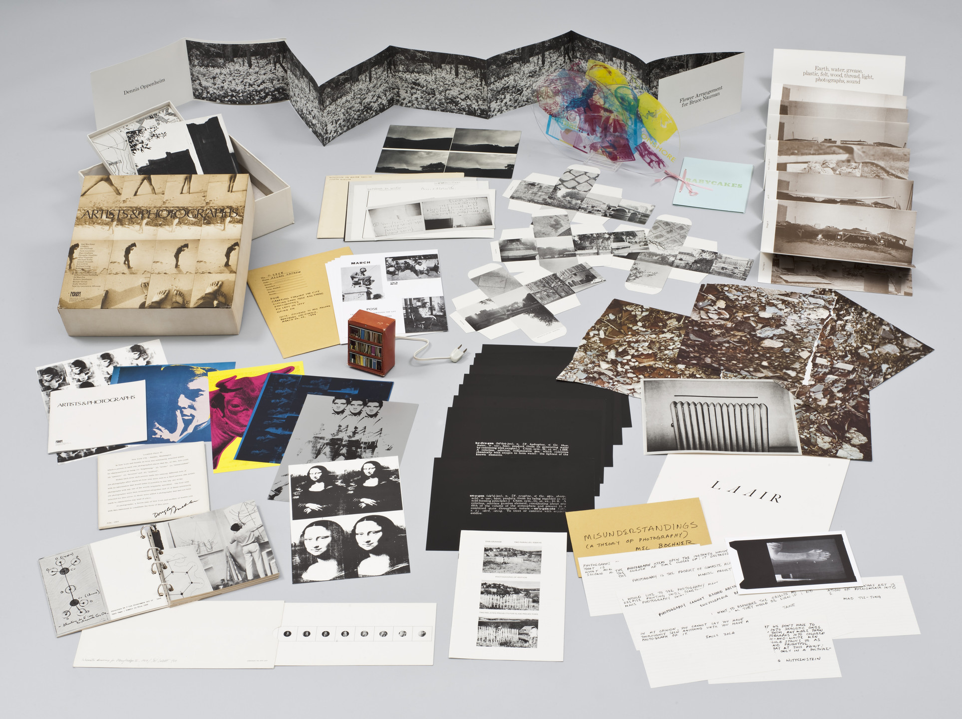 Various Artists, Mel Bochner, Christo, Jan Dibbets, Tom Gormley, Dan Graham, Douglas Huebler, Allan Kaprow, Michael Kirby, Joseph Kosuth, Sol LeWitt, Richard Long, Robert Morris, Bruce Nauman, Dennis Oppenheim, Robert Rauschenberg, Edward Ruscha, Robert Smithson, Bernar Venet, Andy Warhol. Artists &amp; Photographs. 1965–70, published 1970
