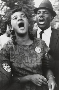 Washington, D.C.: Demonstrators sing "We Shall Overcome" after Dr. Martin Luther King, Jr.'s "I Have a Dream" speech