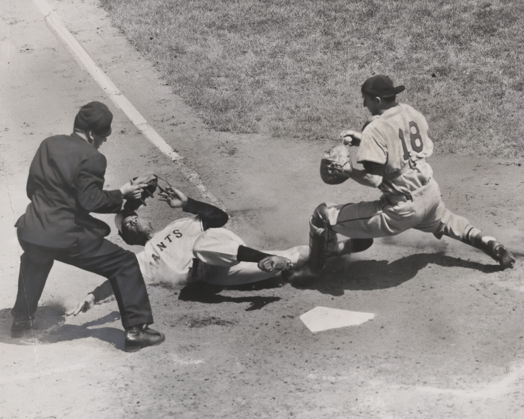 Ernie Sisto/The New York Times. Willie Mays Scoring on a Close Play at the Plate in Polo Grounds. May 2, 1952