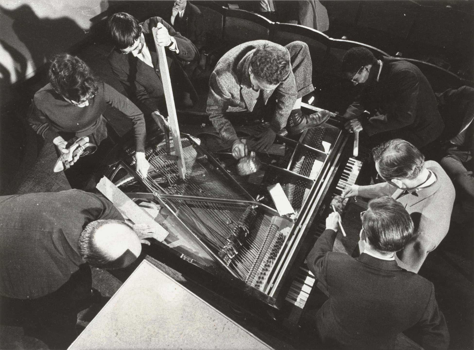 Philip Corner, Emmett Williams, Alison Knowles, George Maciunas, Dick Higgins, Benjamin Patterson. Philip Corner&#39;s Piano Activities, performed by Philip Corner, George Maciunas, Emmett Williams, Benjamin Patterson, Dick Higgins, and Alison Knowles during Fluxus Internationale Festpiele Neuester Musik, Hörsaal des Städtischen Museums, Wiesbaden, Germany, September 1, 1962. 1962