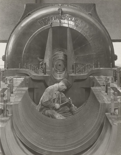 Lewis Wickes Hine. A Worker in his Shrine--The Heart of the Turbine. 1920