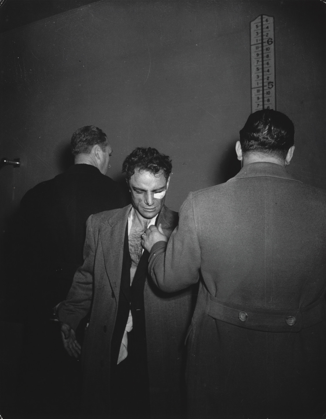 Weegee (Arthur Fellig). Booked on Suspicion of Killing a Policeman. January 1941