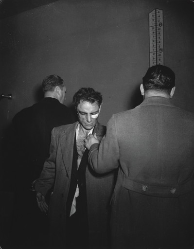 Weegee (Arthur Fellig). Booked on Suspicion of Killing a Policeman. January 1941