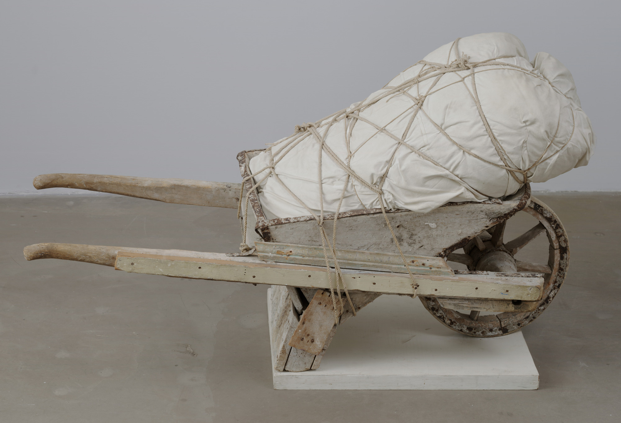 Christo. Package on Wheelbarrow. 1963