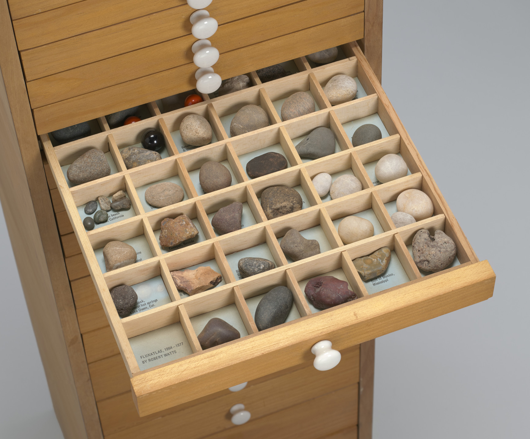 Various Artists, George Maciunas, John Lennon, Jean Dupuy, George Brecht, Ben Vautier, Robert Watts, Geoffrey Hendricks, Takako Saito, Mieko Shiomi, Larry Miller, Ay-O, Claes Oldenburg, Joe Jones. Flux Cabinet. 1975-77