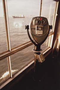 Boy looking at his mother. Staten Island Ferry. New York harbor from the series Fish Story