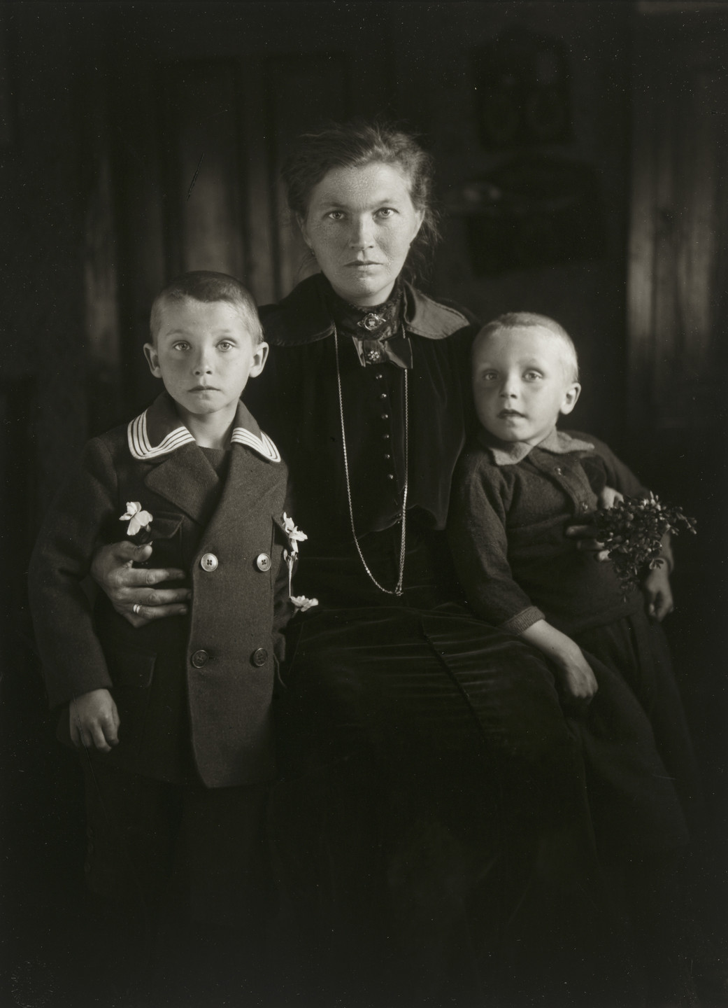 August Sander. Widow with her Sons. c. 1921