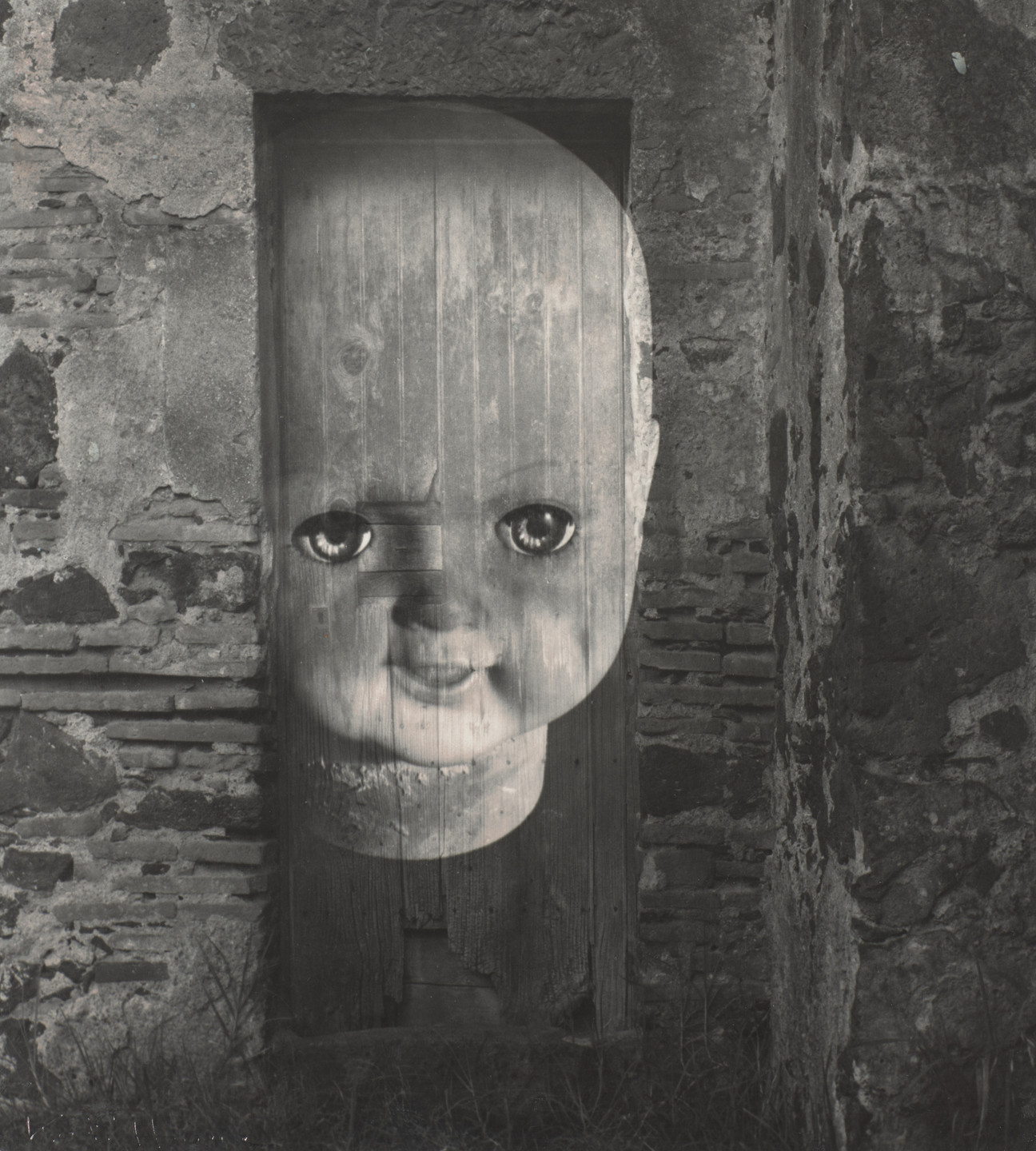 Kati Horna. Doll in Doorway. c. 1938