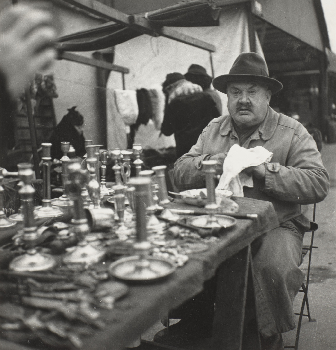 Kati Horna. Man and Candlesticks. c. 1933