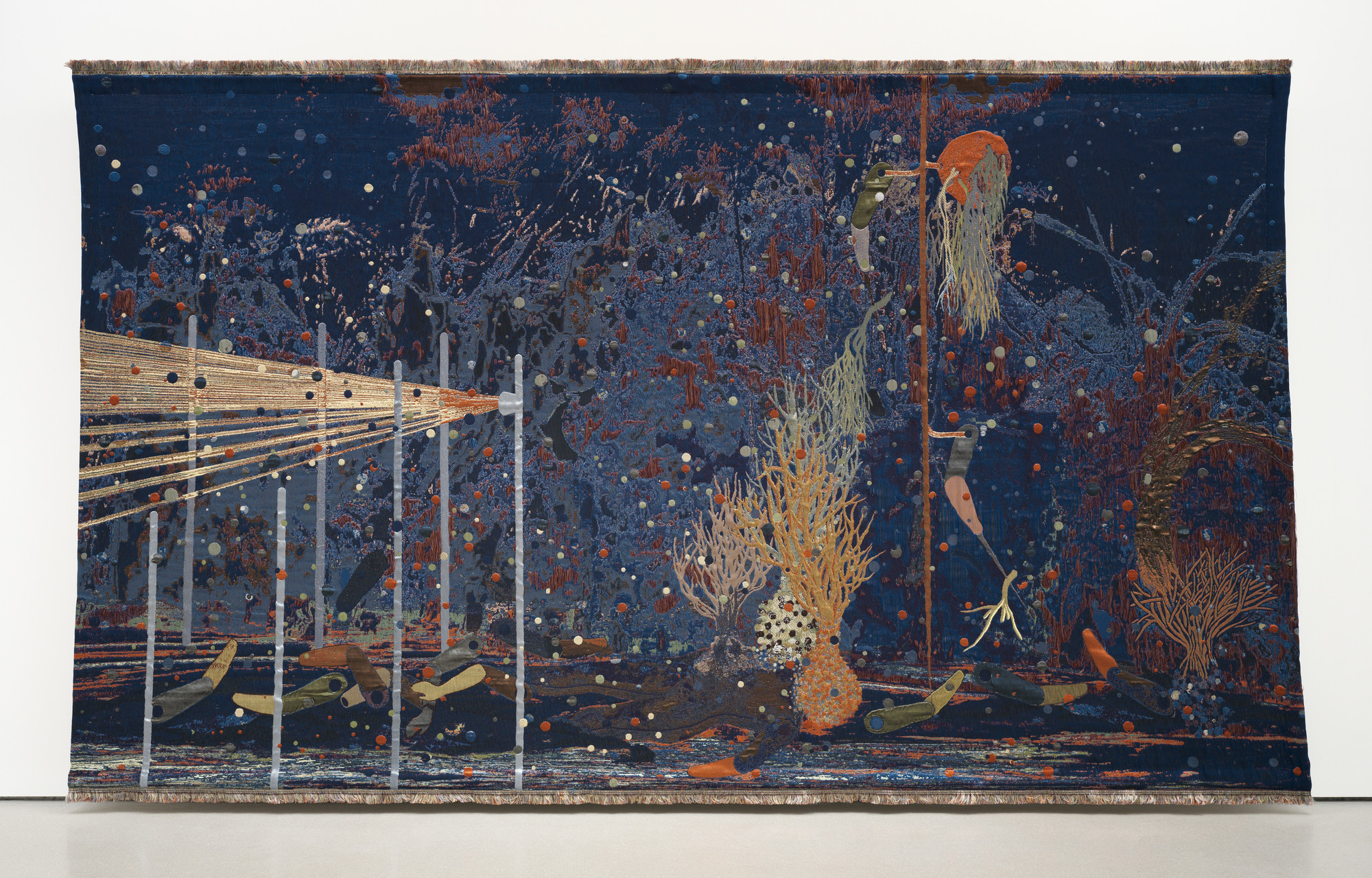A painting featuring deep blues and purples with scattered, multicolored dots. Central figures include vertical lines and organic shapes, resembling plants in the foreground. This is an AI generated description. To give feedback, email ai@moma.org.