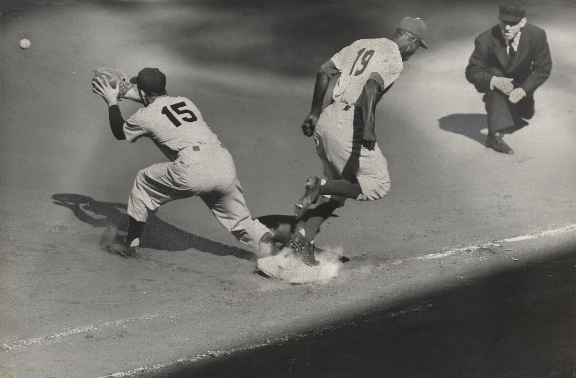 Ernie Sisto/The New York Times. World Series: Yankees vs. Dodgers (Gilliam slides into second). September 28, 1955