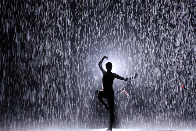 Random International. <em>Rain Room.</em> Installation view at The Museum of Modern Art with dancers from WayneMcGregor | Random Dance. <em>Rain Room</em> is part of MoMA PS1's <em>EXPO 1: New York</em>, 2013. Photo by Charles Roussel