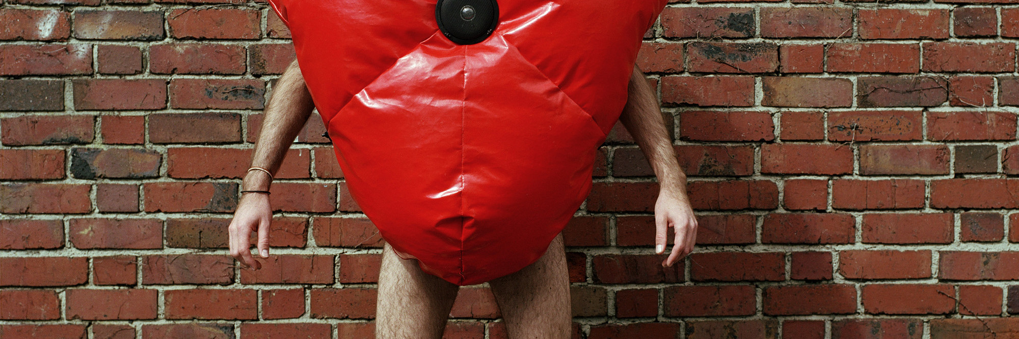 Ralph Borland. Suited for Subversion Prototype. 2002. Nylon-reinforced PVC, padding, speaker, and pulse reader, 47 1/4 × 31 1/2 × 23 5/8″ (120 × 80 × 60 cm). Fund for the Twenty-First Century