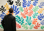Installation view of Henri Matisse: The Cut-Outs, The Museum of Modern Art, October 12, 2014–February 10, 2015. © 2015 The Museum of Modern Art. Photo: Scott Rudd. Shown: Henri Matisse. The Sheaf (La Gerbe). 1953. Maquette for ceramic (realized 1953). Gouache on paper, cut and pasted, on paper, mounted on canvas, 115 ¾ x 137 ¾” (294 x 350 cm). Collection University of California, Los Angeles. Hammer Museum. Gift of Mr. and Mrs. Sidney F. Brody. © 2015 Succession H. Matisse/Artists Rights Society (ARS), New York