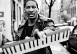 Jon Batiste. Photo by Billy Kidd
