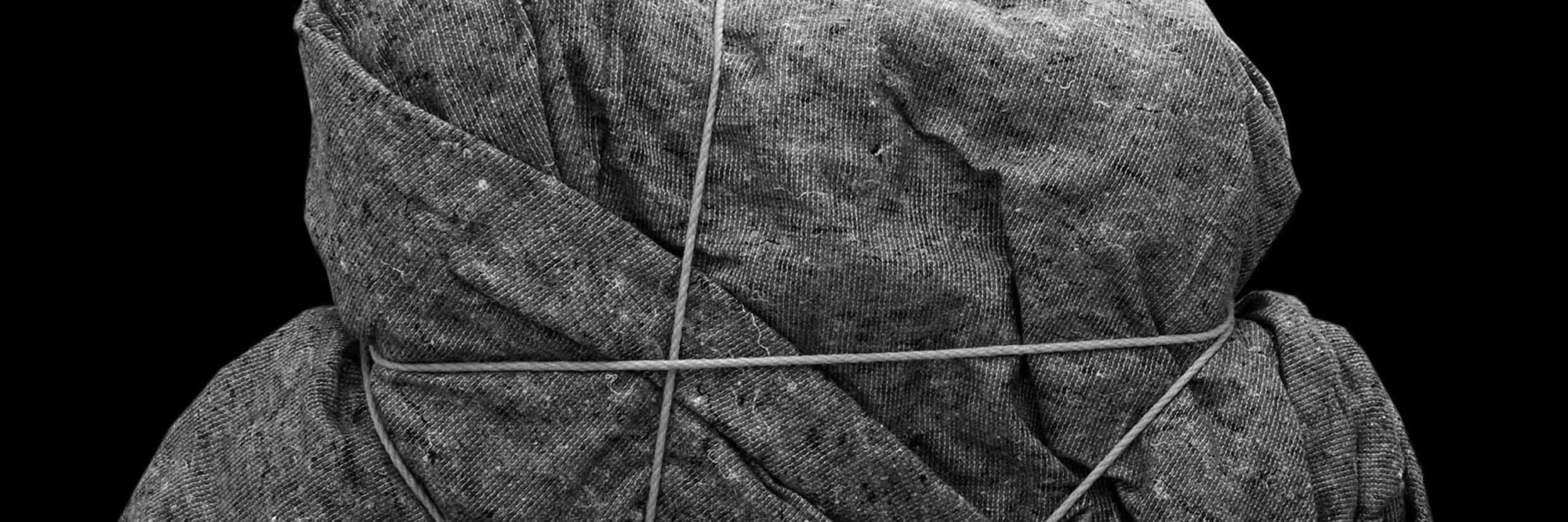 Henrik Olesen. Imitation/Enigma (2). 2008. Box, adhesive tape, rope, padding material, and blanket, 23 5/8 x 39 3/8 x 11 13/16&#34; (60 x 100 x 30 cm). © Henrik Olesen. Courtesy the artist and Galerie Daniel Buchholz, Cologne and Berlin