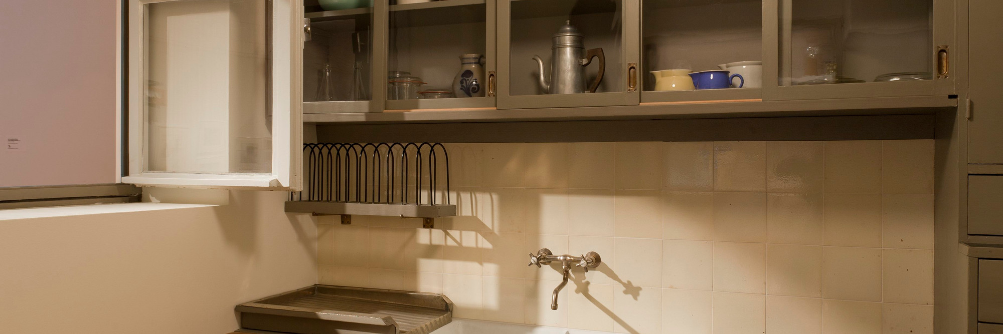 Margarete Schütte-Lihotzky (Austrian, 1897–2000). Frankfurt Kitchen from the Ginnheim- Höhenblick Housing Estate, Frankfurt-am-Main, Germany, 1926–27. Installation view of Counter Space: Design and the Modern Kitchen. The Museum of Modern Art, New York, September 15, 2010–May 2, 2011. 8′9″ × 12′10″ × 6′10″ (266.7 × 391.2 × 208.3 cm). The Museum of Modern Art, New York. Gift of Joan R. Brewster in memory of her husband George W. W. Brewster, by exchange and the Architecture &amp; Design Purchase Fund, 2009. Photo: Jonathan Muzikar