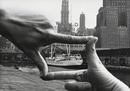 John Baldessari (American, b. 1931). Hands Framing New York Harbor from Pier 18. 1971. Photograph by Shunk-Kender (Harry Shunk [German, 1924–2006] and János Kender [Hungarian, 1937–2009]). Gelatin silver print, 7 3/8 × 9 15/16&#34; (18.8 × 25.2 cm). The Museum of Modern Art, New York. Gift of the Roy Lichtenstein Foundation in honor of Jennifer Winkworth and Kynaston McShine and in memory of Harry Shunk and János Kender. © 2015 John Baldessari. Photograph: Shunk-Kender © J. Paul Getty Trust. The Getty Research Institute, Los Angeles