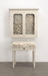 Marcel Broodthaers. Armoire blanche et table blanche (White Cabinet and White Table). 1965. Painted cabinet, table, and eggshells; cabinet 33 7/8 × 32 1/4 × 24 1/2″ (86 × 82 × 62 cm), table 41 × 39 3/8 × 15 3/4″ (104 × 100 × 40 cm). The Museum of Modern Art, New York. Fractional and promised gift of Jo Carole and Ronald S. Lauder. © 2015 Estate of Marcel Broodthaers/Artists Rights Society (ARS), New York/SABAM, Brussels