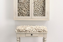 Marcel Broodthaers. Armoire blanche et table blanche (White Cabinet and White Table). 1965. Painted cabinet, table, and eggshells; cabinet 33 7/8 × 32 1/4 × 24 1/2″ (86 × 82 × 62 cm), table 41 × 39 3/8 × 15 3/4″ (104 × 100 × 40 cm). The Museum of Modern Art, New York. Fractional and promised gift of Jo Carole and Ronald S. Lauder. © 2015 Estate of Marcel Broodthaers/Artists Rights Society (ARS), New York/SABAM, Brussels