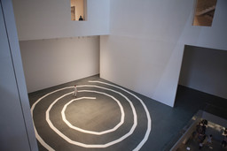 Performance of James Lee Byars’s The Mile-Long Paper Walk (1965–2014) at The Museum of Modern Art, August 17, 2014. Performed by Katie Dorn; choreographic construction by Lucinda Childs. © 2014 Museum of Modern Art, New York. Photo by Julieta Cervantes