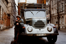 Eberhard Grames (German, b. 1953). Man with His Truck, East Germany. 1990. Chromogenic color print, 15 3/4 × 19 3/4ʺ (40 × 50.2 cm). Horace W. Goldsmith Fund through Robert B. Menschel. © 2016 Ebergard Grames