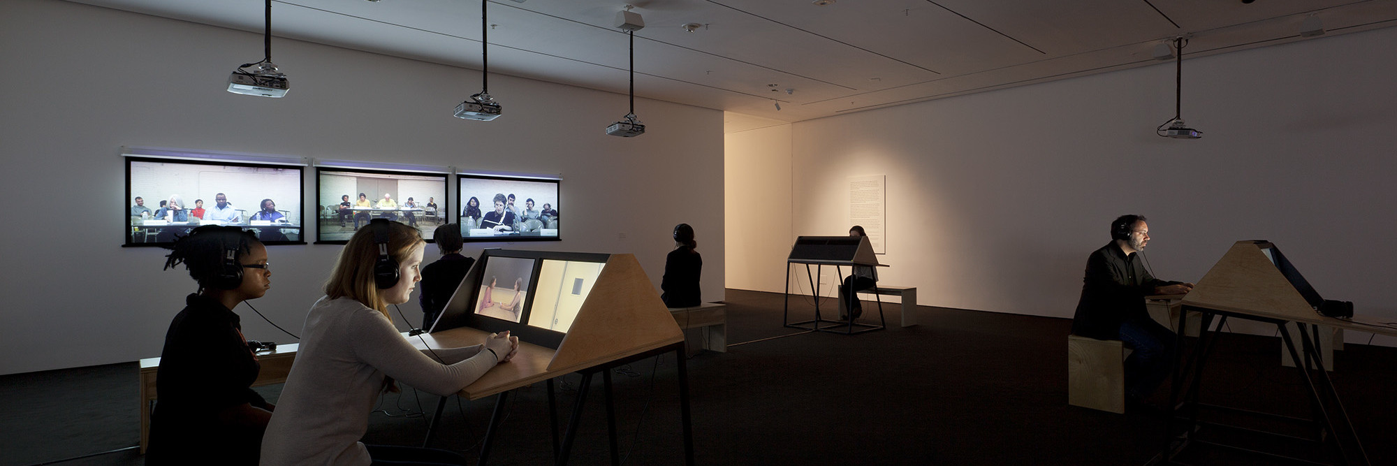 Andrea Geyer, Sharon Hayes, Ashley Hunt, Katya Sander, David Thorne. 9 Scripts from a Nation at War. 2007. Ten-channel video installation (color, sound). The Museum of Modern Art, New York. Committee on Media and Performance Art Funds. © 2012 the artists. Photograph by Jonathan Muzikar