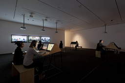 Andrea Geyer, Sharon Hayes, Ashley Hunt, Katya Sander, David Thorne. 9 Scripts from a Nation at War. 2007. Ten-channel video installation (color, sound). The Museum of Modern Art, New York. Committee on Media and Performance Art Funds. © 2012 the artists. Photograph by Jonathan Muzikar