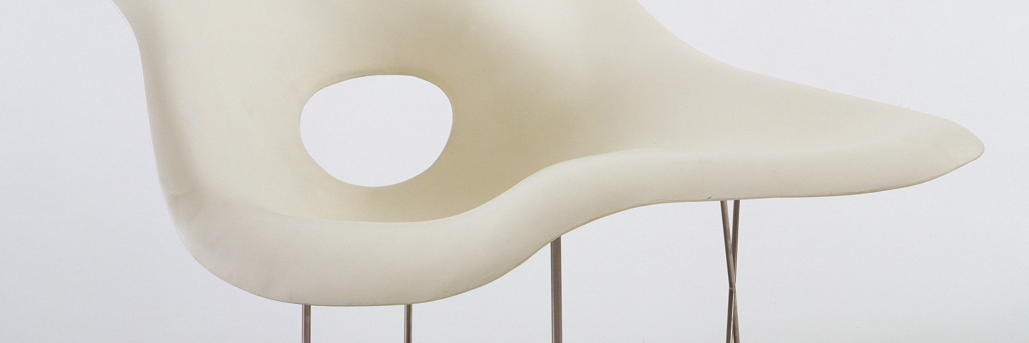 Charles Eames and Ray Eames. Full Scale Model of Chaise Longue (La Chaise). 1948. Hard rubber foam, plastic, wood, and metal, 32 1/2 × 59 × 24 1/4″ (82.5 × 149.8 × 87 cm). The Museum of Modern Art. Gift of the designer