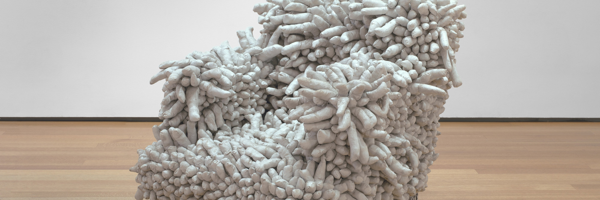 Yayoi Kusama (Japanese, born 1929). Accumulation No. 1. 1962. Sewn stuffed fabric, paint, and chair fringe, 37 x 39 x 43″ (94 x 99.1 x 109.2 cm). The Museum of Modern Art, New York. Purchase