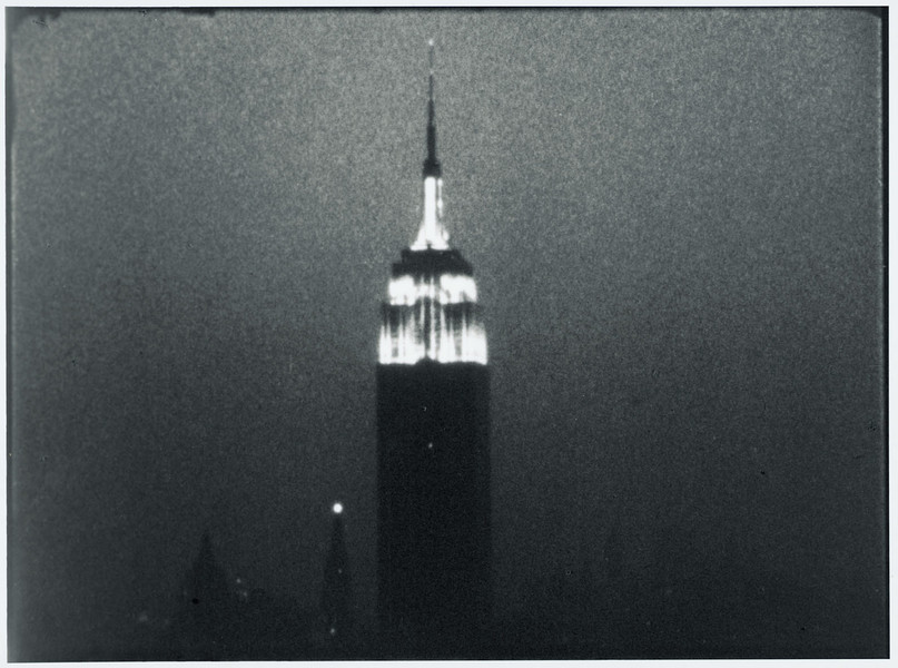 Andy Warhol. Empire. 1964. 16mm film, black and white, silent, approx. 8 hours, 5 minutes. The Museum of Modern Art. Original film elements the gift of The Andy Warhol Foundation for the Visual Arts, restored by the Department of Film and Media, The Museum of Modern Art. © 2006 The Andy Warhol Museum, Pittsburgh