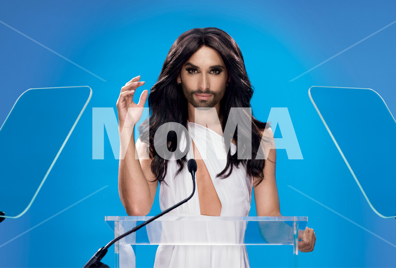 DIS. Positive Ambiguity (beard, lectern, teleprompter, wind machine, confidence). 2015. Commissioned by The Museum of Modern Art