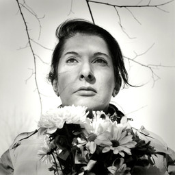 Marina Abramović. Portrait with Flowers. 2009. Black-and-white gelatin silver print; photo: Marco Anelli. © 2010 Marina Abramović. Courtesy the artist and Sean Kelly Gallery/Artists Rights Society (ARS), New York