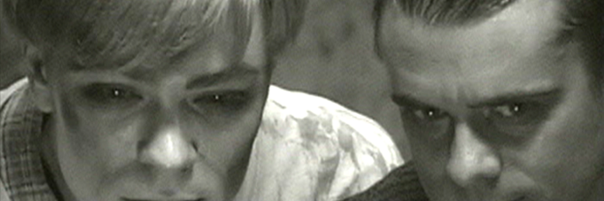 Still from Mike Kelley’s Extracurricular Activity Projective Reconstruction #1 (A Domestic Scene). 2000. Video (black and white, sound), 29:44 min. Courtesy of Mike Kelley Foundation for the Arts