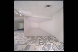 Ricci Albenda. Tesseract. 2001. Installation view. Wallboard, gatorboard, fiberglass, aluminum, paint, and light, 25 × 30 × 10′ (762 × 914.4 × 304.8 cm) (approx.). Courtesy Andrew Kreps Gallery, New York