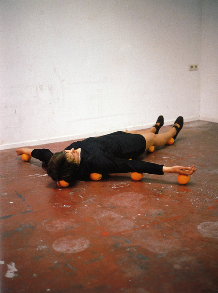 Erwin Wurm. One Minute Sculpture. 1997. C-print, 17 11/16 × 11 13/16″ (45 × 30 cm). Courtesy the artist and Art: Concept, Paris