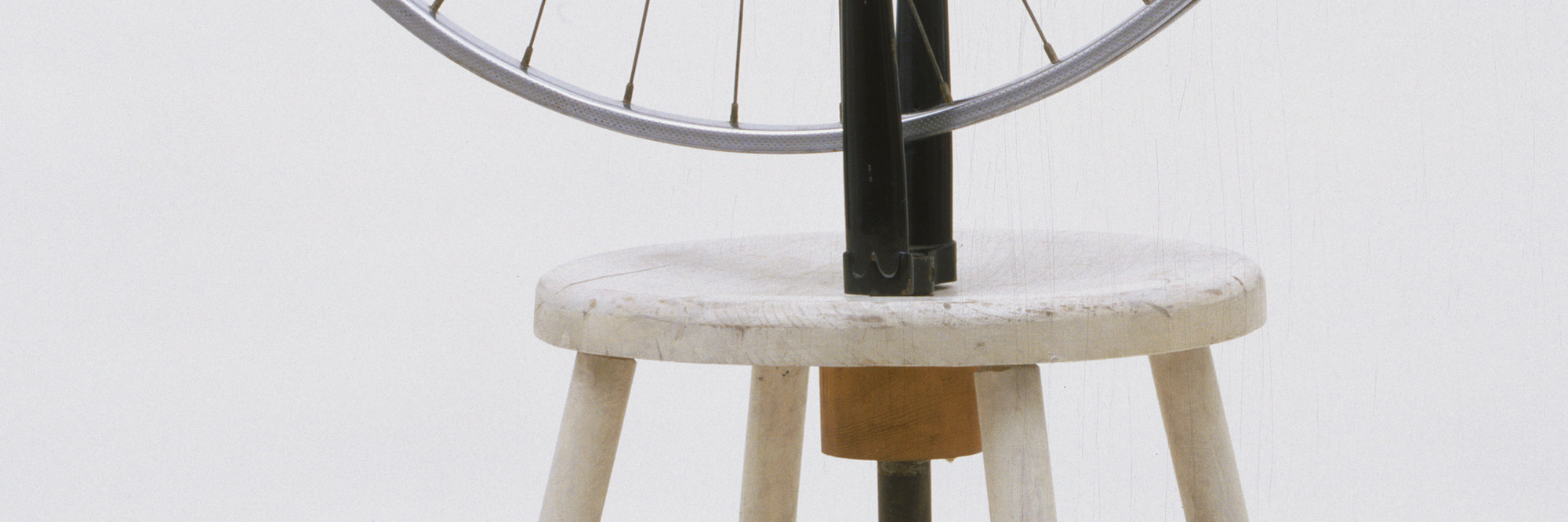 Marcel Duchamp. Bicycle Wheel. New York, 1951 (third version, after lost original of 1913). Metal wheel mounted on painted wood stool, 51 × 25 × 16 1/2ʺ (129.5 × 63.5 × 41.9 cm). The Sidney and Harriet Janis Collection. © 2016 Artists Rights Society (ARS), New York / ADAGP, Paris / Estate of Marcel Duchamp